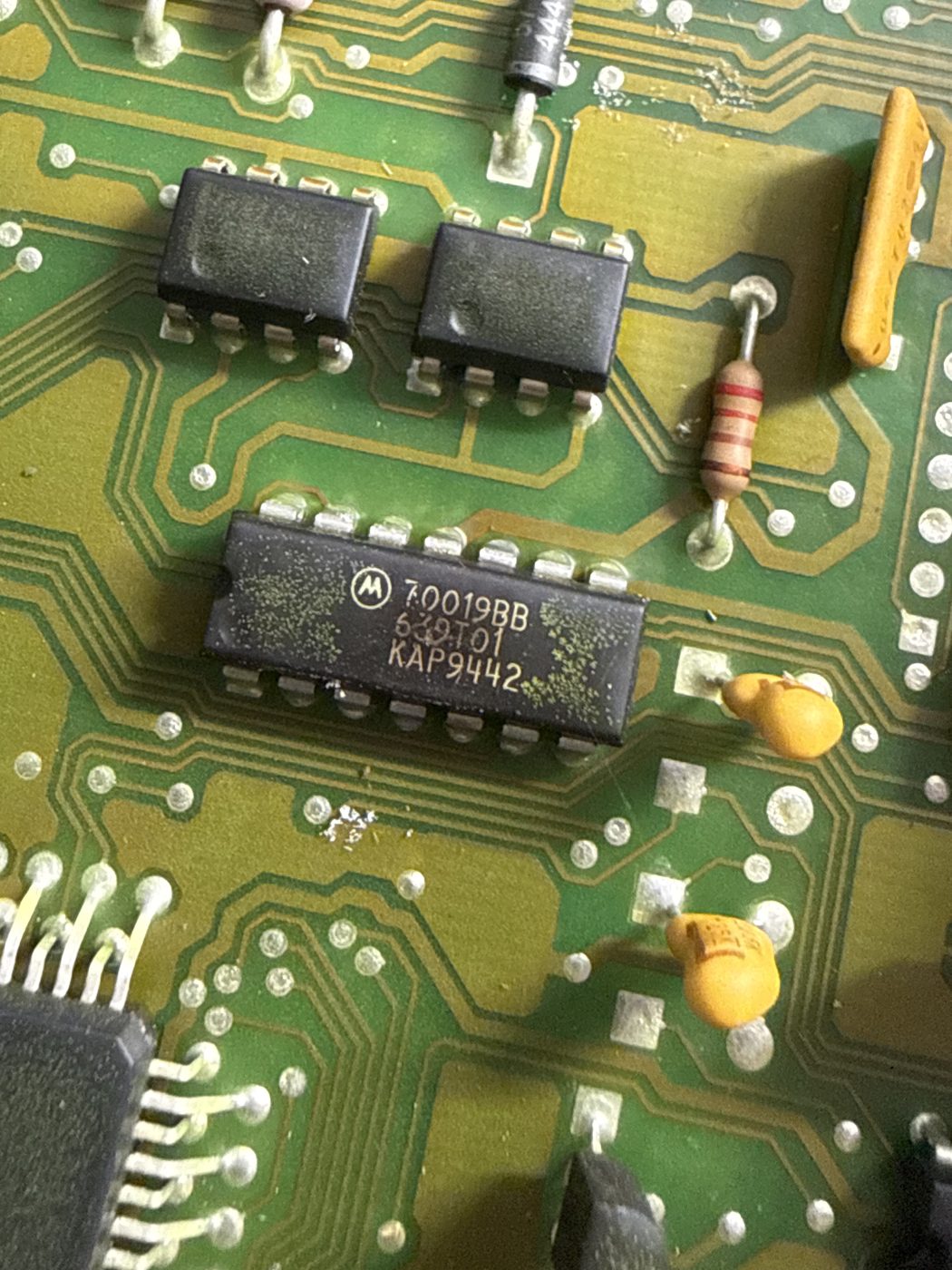 Close-up of the EEC-IV board capacitors and processor